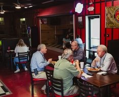 Regulars having lunch in the dining room