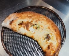 A calzone fresh out of the oven